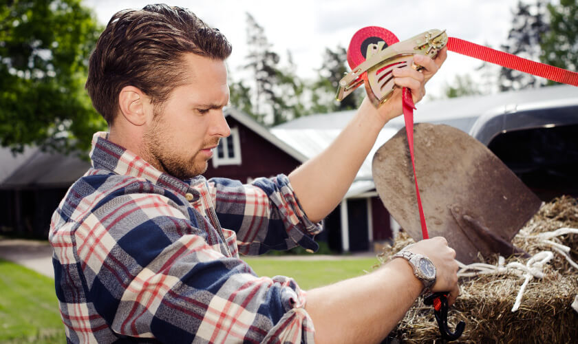 man using a tie down